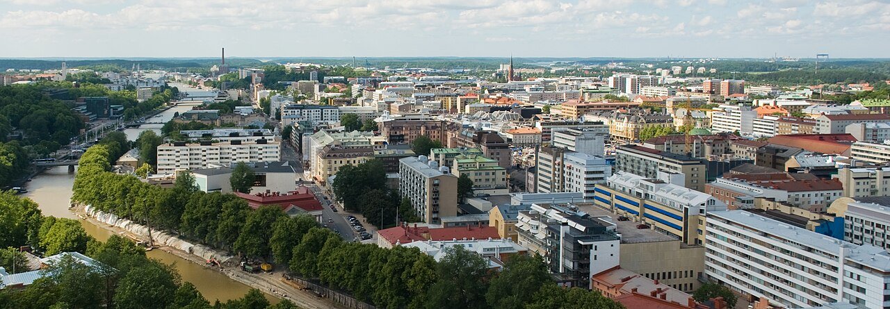 Turku as seen from the tower of Turku Cathedral. The photo mimics another photo taken in late 19th century.